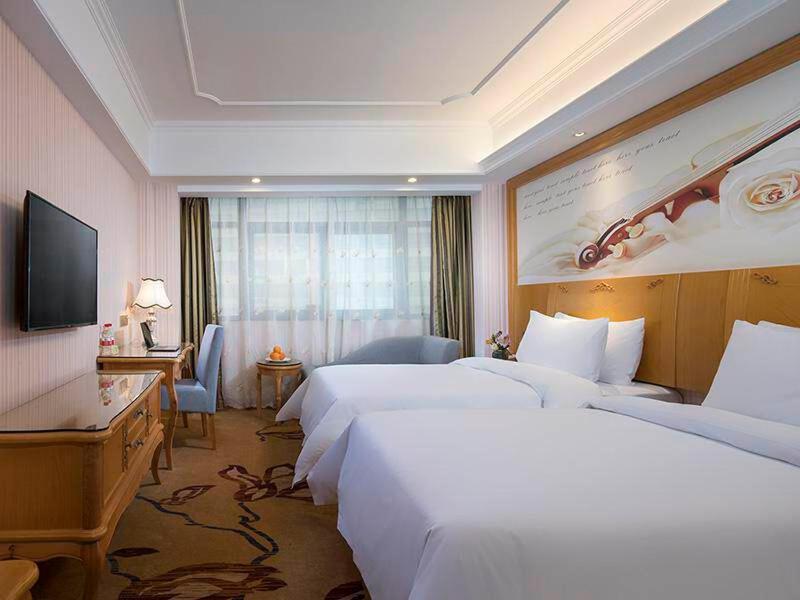 Vienna International Hotel Fenghua Zhongshan Road Exterior foto